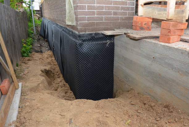 SJ Waterproofing Pros technician performing targeted Foundation Crack Repair assessment in Brownsburg, IN